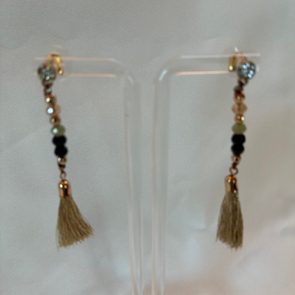 Earrings - dangling with black and gold beads and gold tassel at bottom.